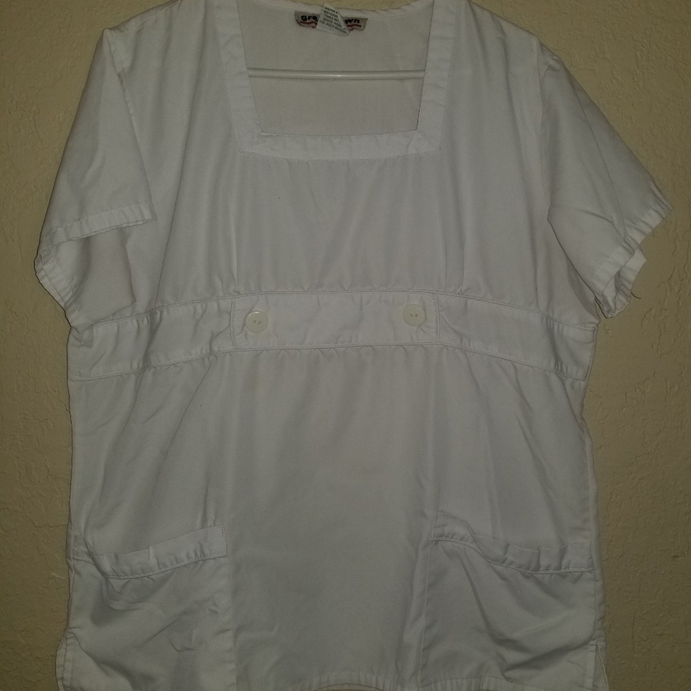 Two white scrub tops